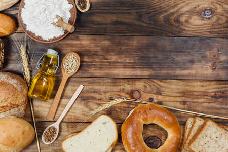 Sliced fresh gluten-free bread on wooden surface