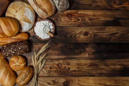 Sliced fresh gluten-free bread on wooden surfaceの写真素材