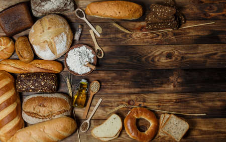 Sliced fresh gluten-free bread on wooden surfaceの写真素材