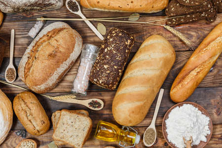 Sliced fresh gluten-free bread on wooden surfaceの写真素材