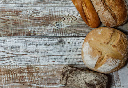 Fresh gluten free bread on a wooden surface in provence style
