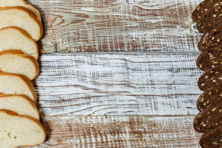 Fresh gluten free bread on a wooden surface in provence styleの写真素材