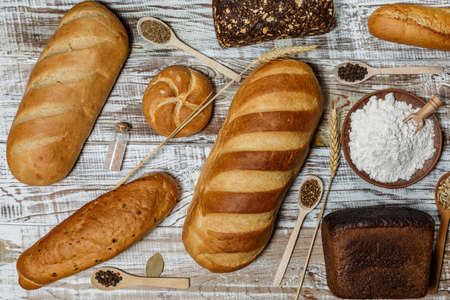 Fresh gluten free bread on a wooden surface in provence styleの写真素材