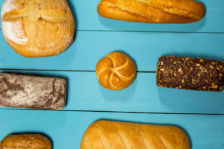 Fresh gluten free bread on blue backgroundの写真素材