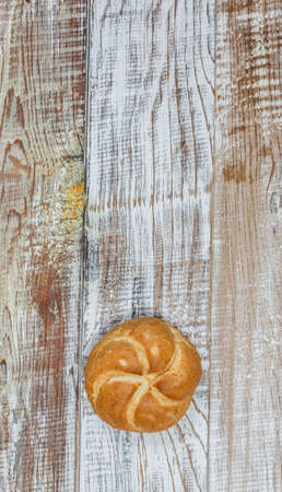 Fresh gluten free bread on a wooden surface in provence style