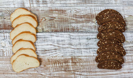 Fresh gluten free bread on a wooden surface in provence styleの写真素材