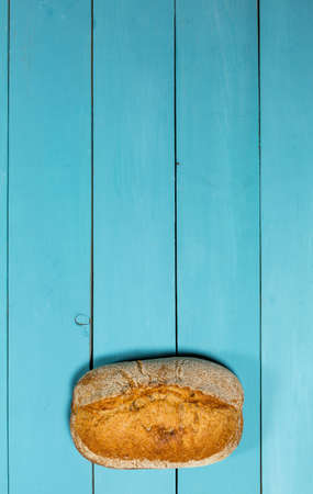 Fresh gluten free bread on blue backgroundの写真素材