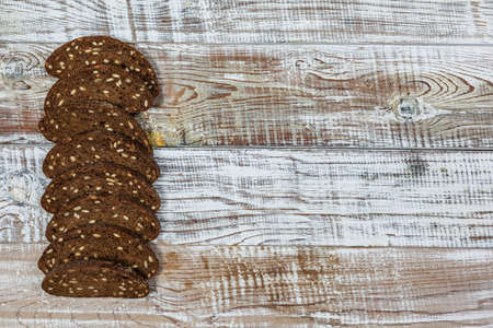 Fresh gluten free bread on a wooden surface in provence style