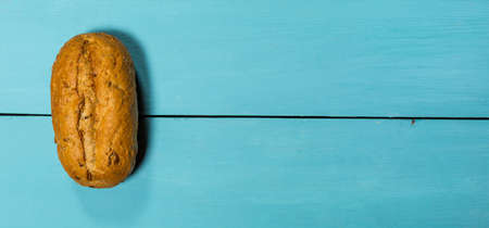 Fresh gluten free bread on blue backgroundの写真素材