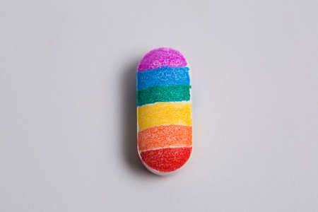 Tablet with lgbt flowers, rainbow, on white backgroundの写真素材