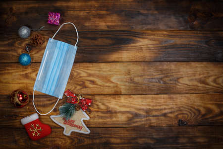 Beautiful Christmas toys for the Christmas tree, Christmas decorations, medical mask, pandemicの写真素材