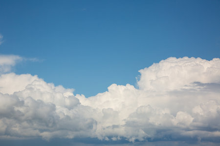 Beautiful white clouds over the river bankの写真素材