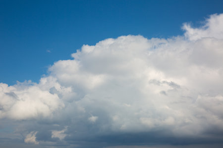 Beautiful white clouds over the river bankの写真素材