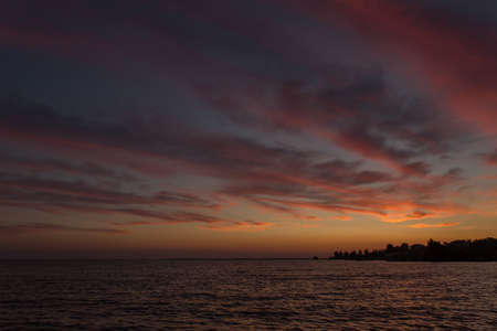 Dramatic sunrise over the river. Orange sunriseの写真素材