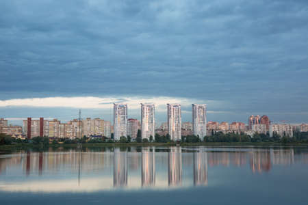 Multi-storey buildings of a big city near the riverの写真素材