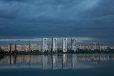 Multi-storey buildings of a big city near the riverの写真素材