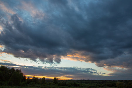 Large clouds in cloudy weather at sunsetの写真素材