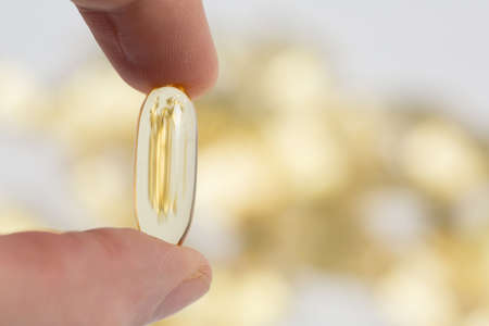 Omega 3 vitamins for health, fish oil, dietary supplementの写真素材