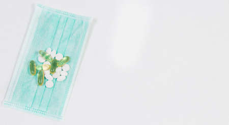 Useful different vitamins and protective medical maskの写真素材
