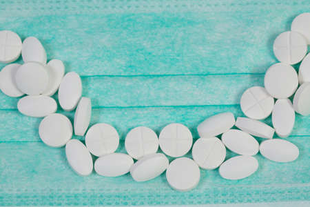 Useful different vitamins and protective medical maskの写真素材