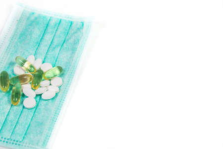 Useful different vitamins and protective medical maskの写真素材