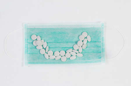 Useful different vitamins and protective medical maskの写真素材