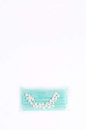 Useful different vitamins and protective medical maskの写真素材