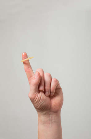 Safe sex condom in man's hand, contraceptiveの写真素材