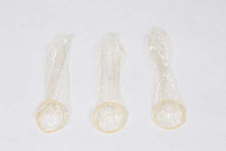 Condom in man's hand, contraception, health safety, safe loveの写真素材