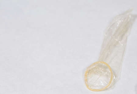 Condom in man's hand, contraception, health safety, safe loveの写真素材