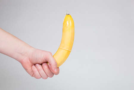 Condom in man's hand, contraception, health safety, safe loveの写真素材
