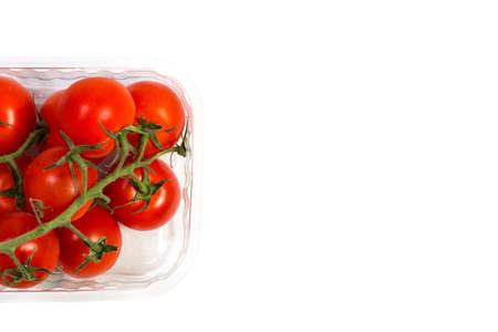 Red cherry tomatoes for salad on white backgroundの写真素材