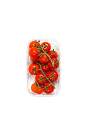 Red cherry tomatoes for salad on white backgroundの写真素材