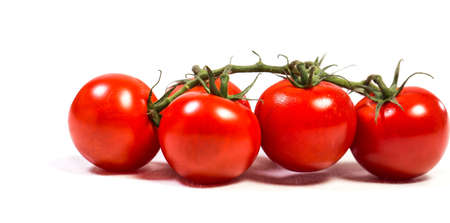 Red cherry tomatoes for salad on white backgroundの写真素材