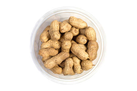 Peanuts in shell on white background, healthy foodの写真素材