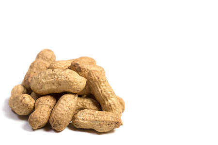 Peanuts in shell on white background, healthy foodの写真素材