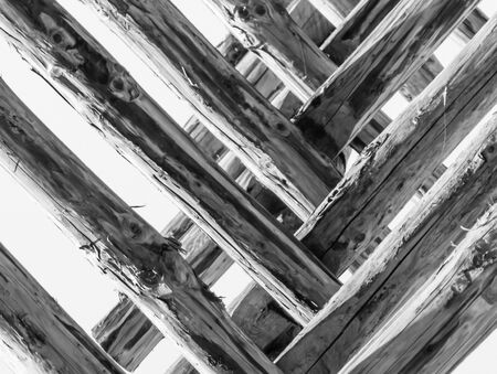 Wooden skeleton of a summer building under construction. Abstraction.の写真素材