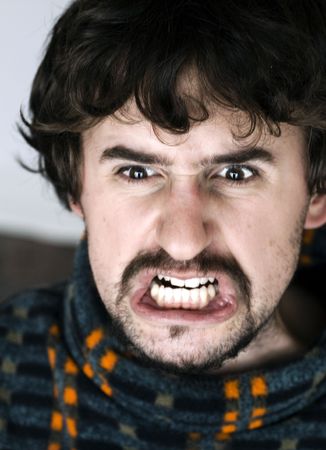 Close up of angry young man