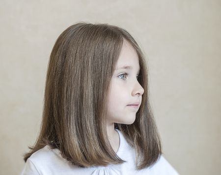 Side view portrait of a little girlの写真素材