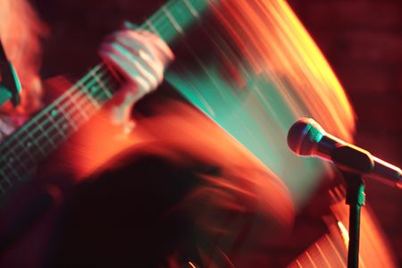 guitarist in nightclub,blur in movingの写真素材