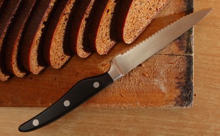 bread and  knife,focus on a knife
