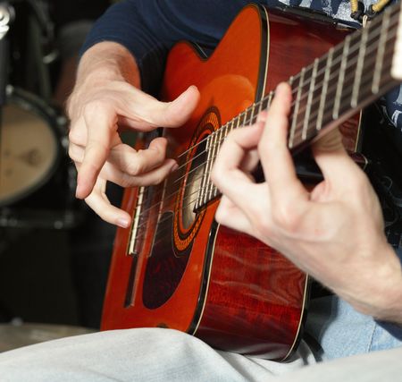 hand of guitarist,shallow DOF