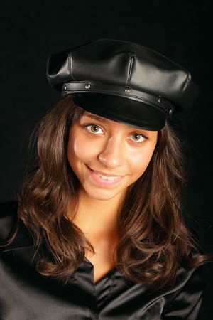 girl with long hair in black hatの写真素材