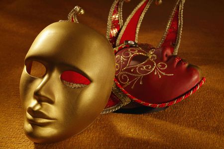 venetian masks on a textileの写真素材