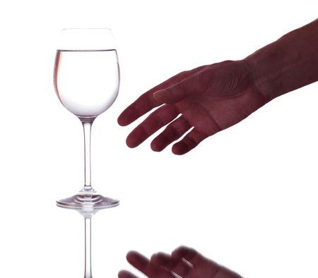 hand and glass with waterの写真素材