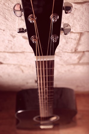 black guitar,focus on a foreground