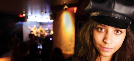 girl with long hair in black hatの写真素材