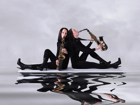  woman in black with saxophone.の写真素材