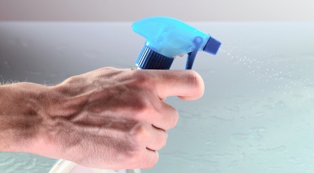 Hand of the worker with a spray.の写真素材