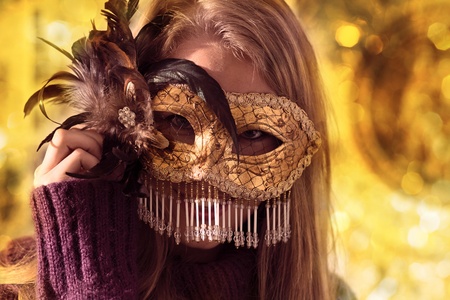 The woman with Venetian mask .の写真素材